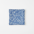 Dessous-de-verre tissé fait main bleu motifs abstraits