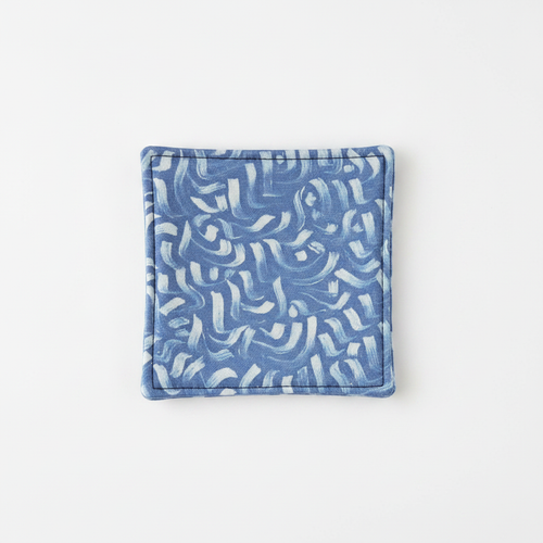 Dessous-de-verre tissé fait main bleu motifs abstraits