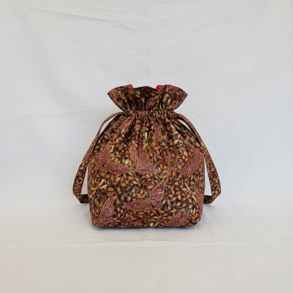 Sac bourse cachemire doré fond minimaliste
